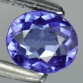  ok. 0,58ct/1szt -UJMUJĄCY TANZANIT NAT.-  5,89x5,04mm 2,50mm głęb. owal