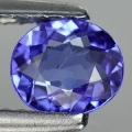  ok. 0,58ct/1szt -UJMUJĄCY TANZANIT NAT.-  5,89x5,04mm 2,50mm głęb. owal
