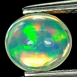 ok. 1,02ct/1szt. -PRZEPIĘKNY OPAL NAT.- unikat 7,72x6,91mm / 4,32mm głęb. owal