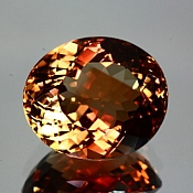 ok. 17,765ct/1szt. -CERTYFIKOWANY IMPERIAL TOPAZ NAT.- 16,54x14,18/9,75mm owal